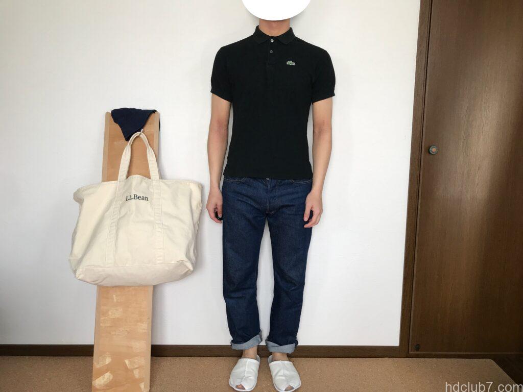 ラコステのボーイズのフランス製ポロシャツ5191Lとリーバイス501を着た人