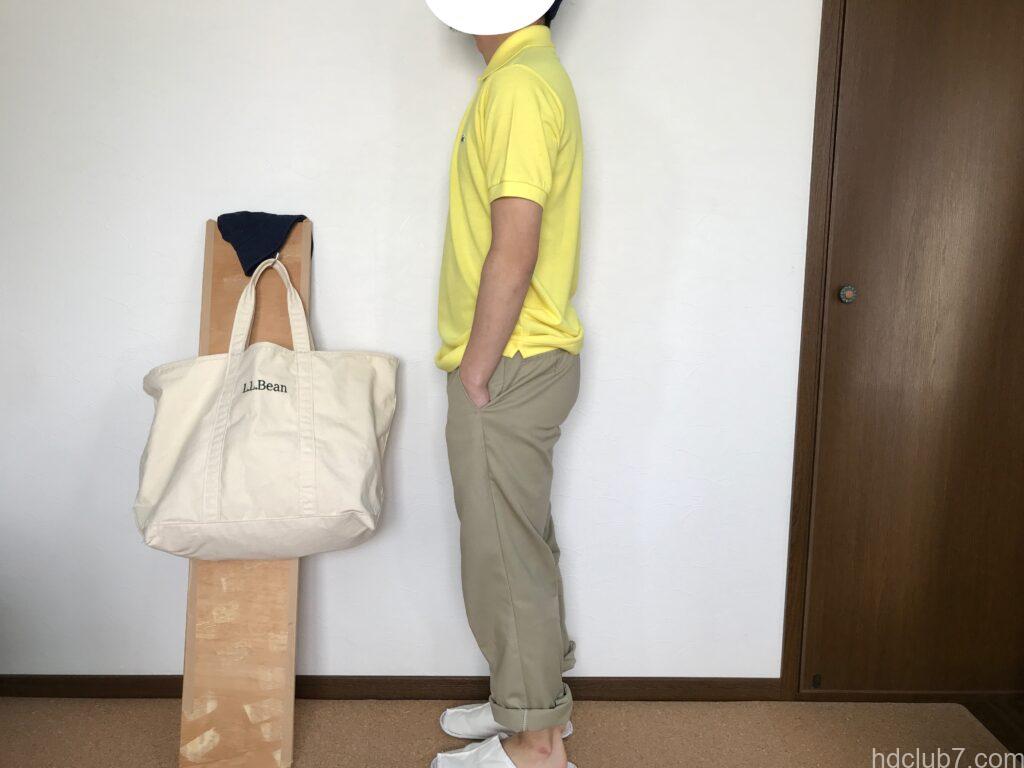 ラコステの日本製ポロシャツL1212ALの新品とディッキーズ874を着た男