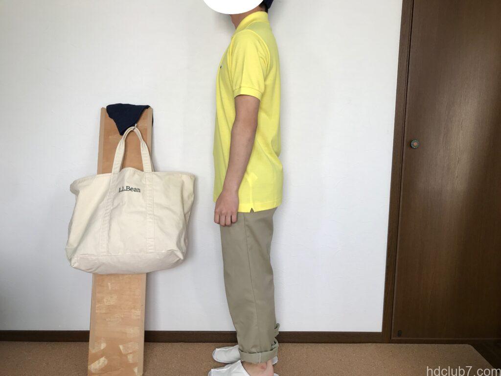 ラコステの日本製ポロシャツL1212ALの新品とディッキーズ874を着た男