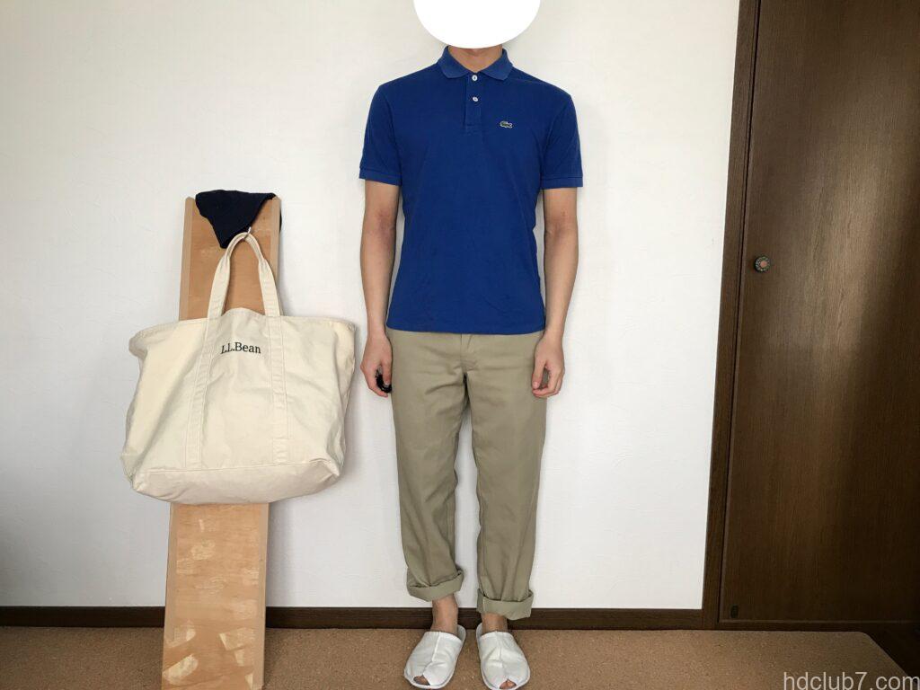 ラコステのポロシャツのボーイズモデルL1812とディッキーズ874を着た人
