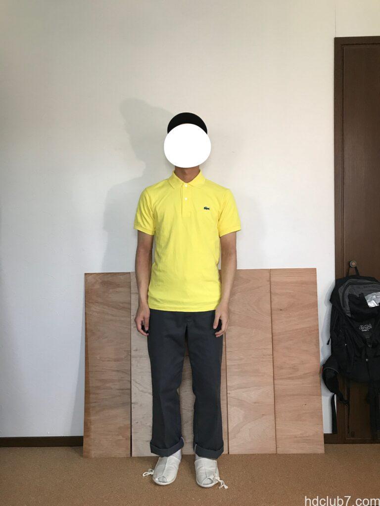 5度洗濯したラコステのポロシャツL1212のサイズ2とディッキーズ874を着た人