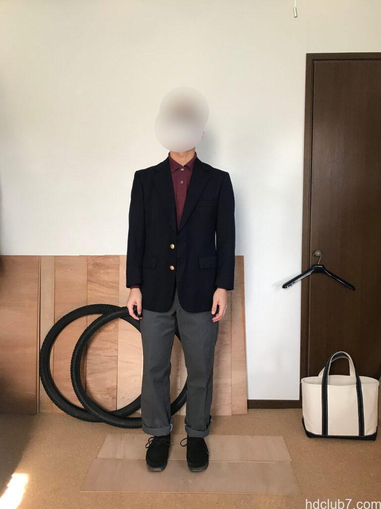 ラコステの長袖ポロシャツL1312にブレザーを羽織った人