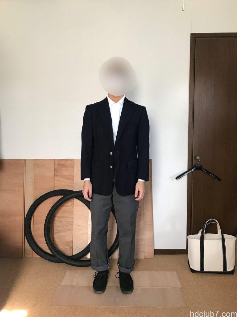 ラコステの長袖ポロシャツL1312にブレザーを羽織った人