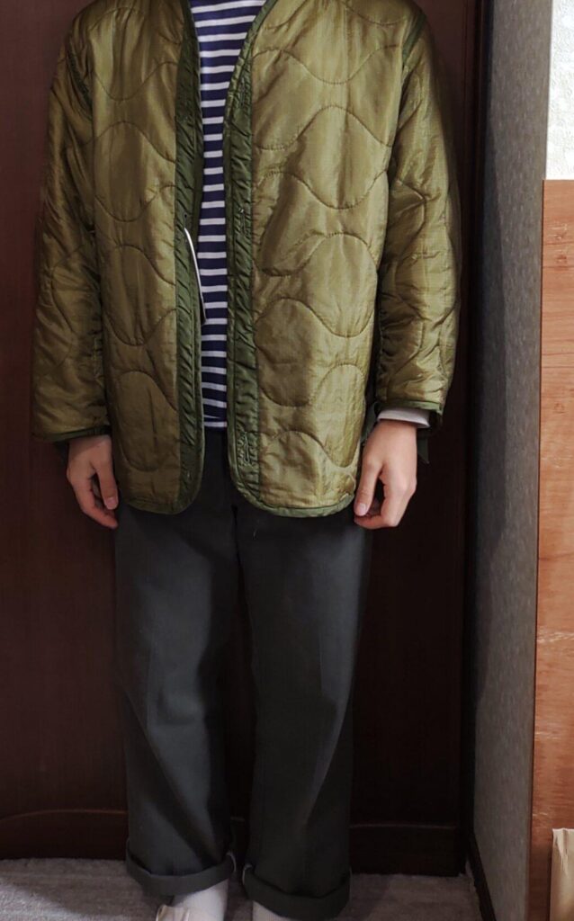 M65ライナーを着た人