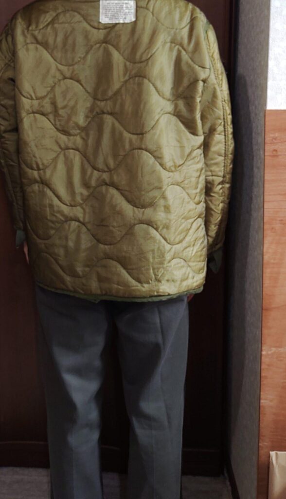 M65ライナーを着た人